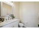 This powder room features modern fixtures and a lovely decorative touch with greenery at 2616 11Th N St, St Petersburg, FL 33704