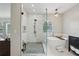 Bathroom featuring stand up shower, free standing tub, and double vanity sinks at 2616 11Th N St, St Petersburg, FL 33704