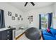 Adorable Bedroom has a crib, beanbag chair, blue sofa and plenty of natural light at 2616 11Th N St, St Petersburg, FL 33704