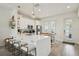 Modern kitchen features stainless steel appliances and a large island with seating at 2616 11Th N St, St Petersburg, FL 33704