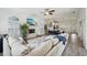 Open-concept living area with fireplace flows seamlessly into the dining area at 2616 11Th N St, St Petersburg, FL 33704