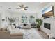 Bright living room features a fireplace, large windows, and modern decor at 2616 11Th N St, St Petersburg, FL 33704