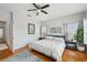 Spacious main bedroom with wood floors, ceiling fan, bright natural light at 2616 11Th N St, St Petersburg, FL 33704