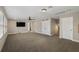 Large bonus room featuring neutral carpet flooring, a ceiling fan, recessed lighting, and plenty of space at 3091 King Fern Dr, Wimauma, FL 33598