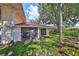 Backyard with patio and lush landscaping at 311 Knottwood Ct, Sun City Center, FL 33573