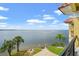 Stunning water views from the private balcony, providing a serene outdoor space to enjoy the coastal scenery at 3236 Gulf Winds Cir, Hernando Beach, FL 34607