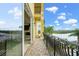 Outdoor balcony showcasing waterfront views with decorative black metal railing at 3236 Gulf Winds Cir, Hernando Beach, FL 34607