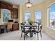 Cozy breakfast nook with a bay window and a beautiful waterfront view at 3236 Gulf Winds Cir, Hernando Beach, FL 34607