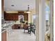 Sunlit breakfast nook with a small table near the kitchen at 3236 Gulf Winds Cir, Hernando Beach, FL 34607