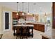 Spacious kitchen with granite countertops, stainless steel appliances, and wooden cabinetry at 3236 Gulf Winds Cir, Hernando Beach, FL 34607