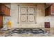 Close-up of kitchen backsplash with decorative mosaic and stainless steel stovetop at 3236 Gulf Winds Cir, Hernando Beach, FL 34607