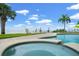 Beautiful pool with stunning ocean views and a relaxing spa, ideal for waterfront enjoyment at 3236 Gulf Winds Cir, Hernando Beach, FL 34607