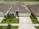 Beautiful home with a well-manicured lawn at 33700 Hamilton Hill Ln, Wesley Chapel, FL 33545