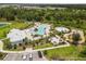 Stunning community pool with a kiddie splash area, clubhouse, grilling area, and plenty of seating for residents at 33700 Hamilton Hill Ln, Wesley Chapel, FL 33545