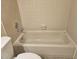 Tiled bathroom with a tub and shower combo at 3455 Countryside Blvd # 33, Clearwater, FL 33761