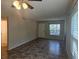 Cozy living room featuring neutral walls, tile floors and lots of natural light at 3455 Countryside Blvd # 33, Clearwater, FL 33761