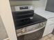 Stainless steel stove with glass top and digital display at 3455 Countryside Blvd # 33, Clearwater, FL 33761