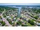 An aerial shot showcases this charming waterfront home nestled within a vibrant and active community at 3691 Center Cir, Largo, FL 33774