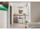 Well-lit bathroom featuring a vanity with storage, a glass-enclosed shower, and a modern design at 3691 Center Cir, Largo, FL 33774