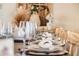 Elegantly set dining table with neutral decor, showcasing the perfect ambiance for a meal at 3691 Center Cir, Largo, FL 33774