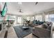 Bright living room with lots of natural light and comfortable seating at 3691 Center Cir, Largo, FL 33774