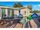 Beautiful backyard pool with water features, lounge chairs, and a tile roof, ideal for outdoor relaxation at 3691 Center Cir, Largo, FL 33774