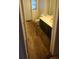 Bathroom with dark wood cabinets, large mirror, and a classic design at 3717 Mckay Creek Dr, Largo, FL 33770