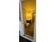 Bathroom featuring a large mirror, pendant lighting, and dark wood cabinets at 3717 Mckay Creek Dr, Largo, FL 33770