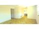 Bright bedroom showing open door, white walls and carpeted floor at 3717 Mckay Creek Dr, Largo, FL 33770