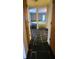 Hallway featuring uniquely patterned tiling leading to adjacent rooms at 3717 Mckay Creek Dr, Largo, FL 33770