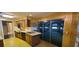 Kitchen featuring a double sink, laminate countertop, and sliding glass doors at 3717 Mckay Creek Dr, Largo, FL 33770