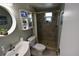 Tiled bathroom with a shower and sink at 3839 Star Island Dr, Holiday, FL 34691