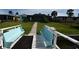 Charming waterfront home with a private dock and seating, ideal for relaxing by the water at 3839 Star Island Dr, Holiday, FL 34691