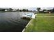 Waterfront property with private dock providing direct access to the waterway, perfect for boating at 3839 Star Island Dr, Holiday, FL 34691