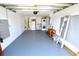 The garage features fresh paint, epoxy floor, and new appliances at 3839 Star Island Dr, Holiday, FL 34691