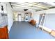 Clean and organized two-car garage offers convenient access to laundry and additional storage options at 3839 Star Island Dr, Holiday, FL 34691