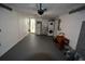 Spacious garage featuring an epoxy floor, laundry and utility sink at 3839 Star Island Dr, Holiday, FL 34691
