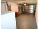 The spacious garage has painted floors and an insulated door at 3839 Star Island Dr, Holiday, FL 34691