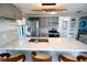 Modern kitchen features stainless steel appliances, a stylish countertop, and updated cabinets at 3839 Star Island Dr, Holiday, FL 34691