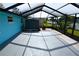 Back lanai view of the lake at 3839 Star Island Dr, Holiday, FL 34691