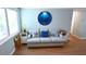 Cozy living room showcases a comfortable sofa, stylish decorations, and bright natural light at 3839 Star Island Dr, Holiday, FL 34691