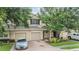 Charming townhouse with well-maintained landscaping, attached garage, and inviting curb appeal at 3922 Silverlake Way, Wesley Chapel, FL 33544