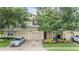 Beautiful townhouse with well-maintained landscaping, attached garage, and inviting curb appeal at 3922 Silverlake Way, Wesley Chapel, FL 33544