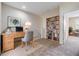 Home office space with built-in bookshelf and modern decor at 3922 Silverlake Way, Wesley Chapel, FL 33544