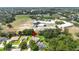 Scenic aerial view of a home, highlighting its proximity to a school and recreational fields at 414 Summit Chase Dr, Valrico, FL 33594