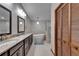 Modern bathroom featuring double vanity, soaking tub and walk-in shower at 414 Summit Chase Dr, Valrico, FL 33594