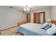 Bedroom featuring a closet, ceiling fan, and double bed with blue bedding at 414 Summit Chase Dr, Valrico, FL 33594