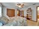 This bedroom features built-in bookcases and natural wood trim, creating a cozy retreat at 414 Summit Chase Dr, Valrico, FL 33594