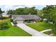 Beautiful one-story home with brick accents, well-manicured lawn, and attached two-car garage at 414 Summit Chase Dr, Valrico, FL 33594