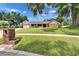 Brick single-story home with inviting front yard and attached garage at 414 Summit Chase Dr, Valrico, FL 33594